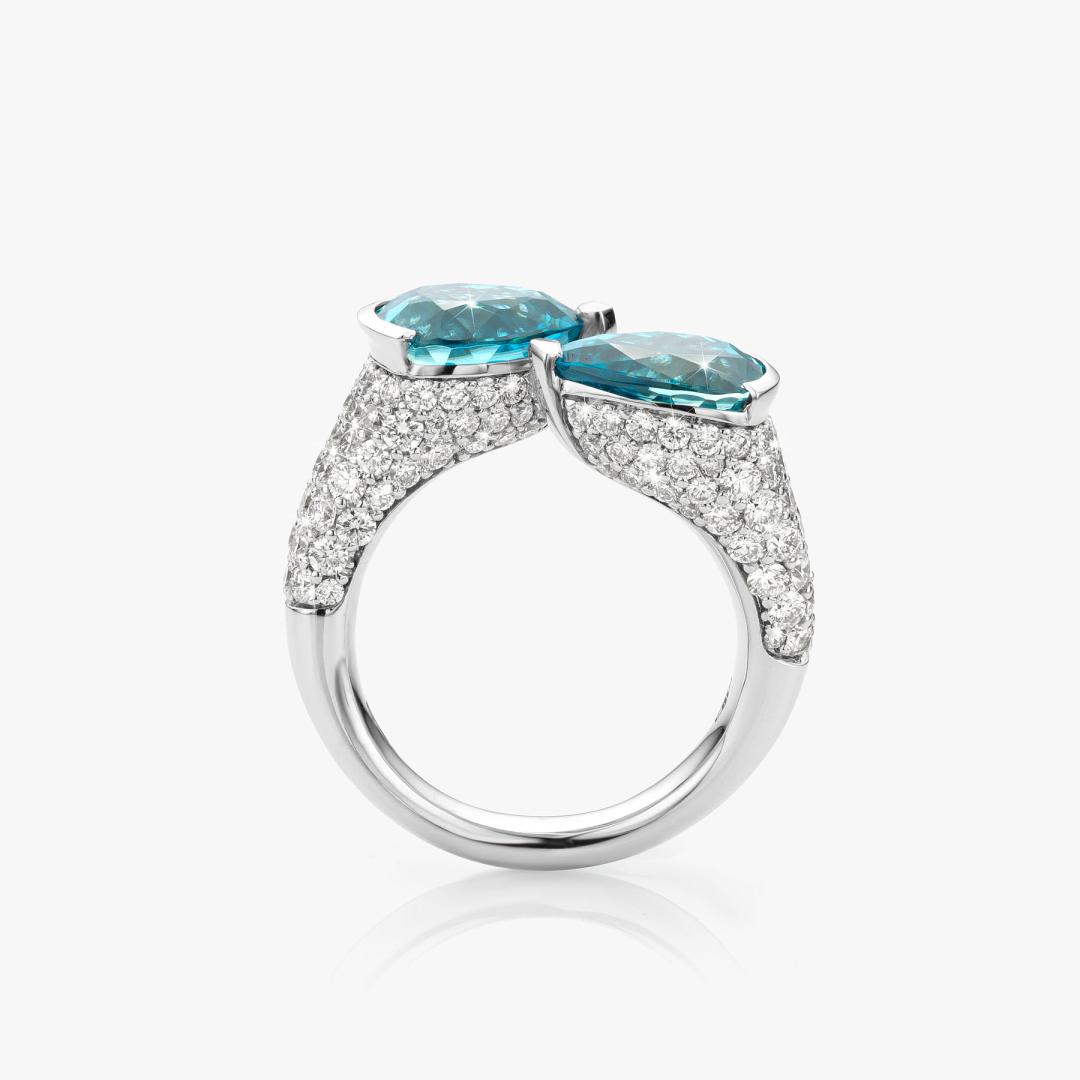 White gold ring set with blue zircon and diamonds made by Atelier Wittmann
