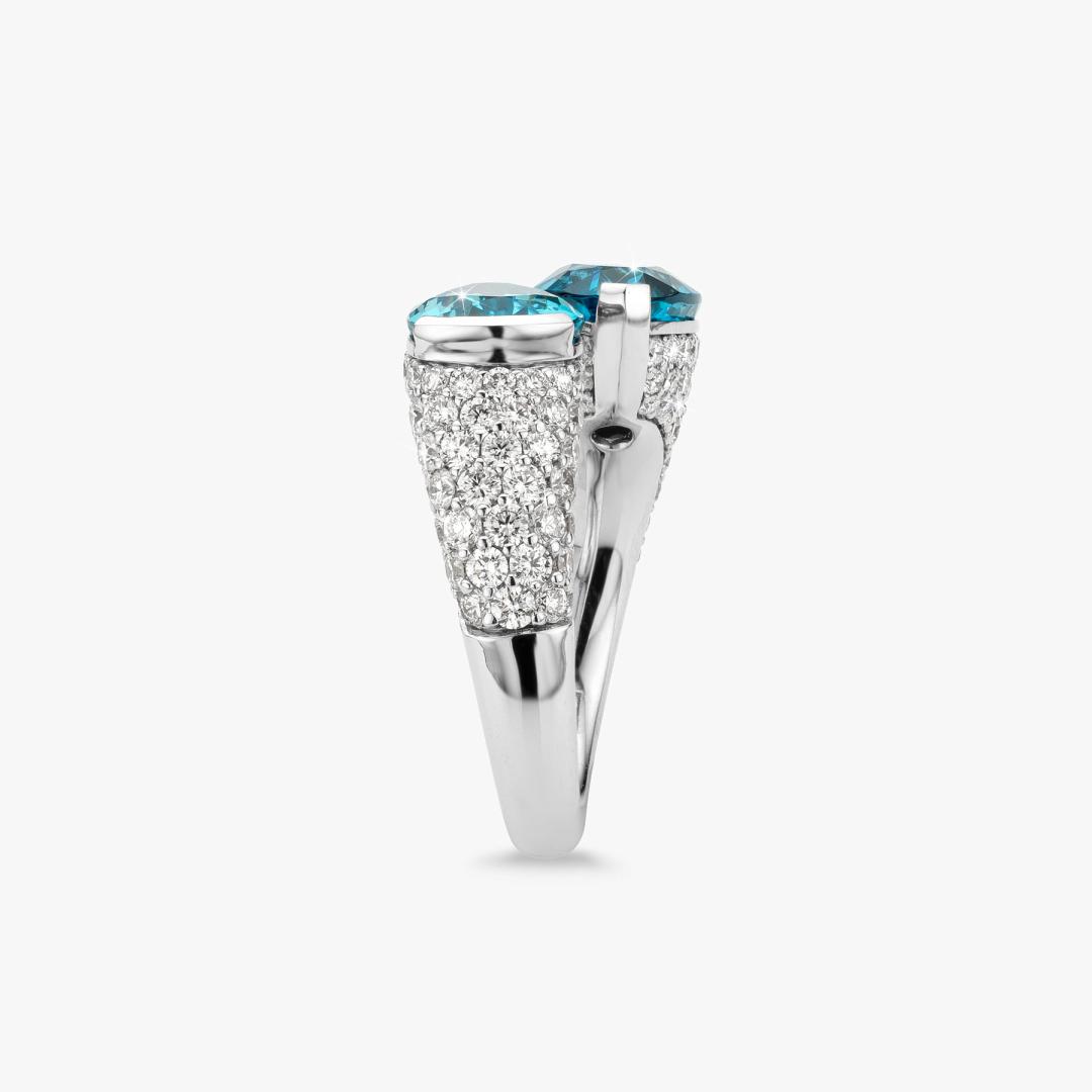 White gold ring set with blue zircon and diamonds made by Atelier Wittmann